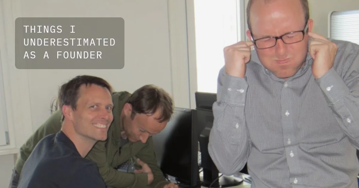 Gregor Zehetner and his co-founders working together at a desk